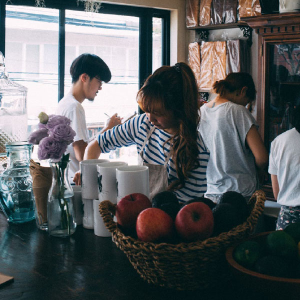 Girl working in Canada at a coffee shop